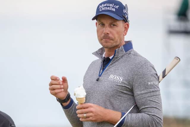 Henrik Stenson enjoys an ice dream during a practice round. Picture: Kenny Smith/SNS