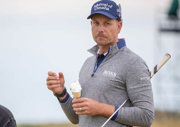 Henrik Stenson enjoys an ice dream during a practice round. Picture: Kenny Smith/SNS
