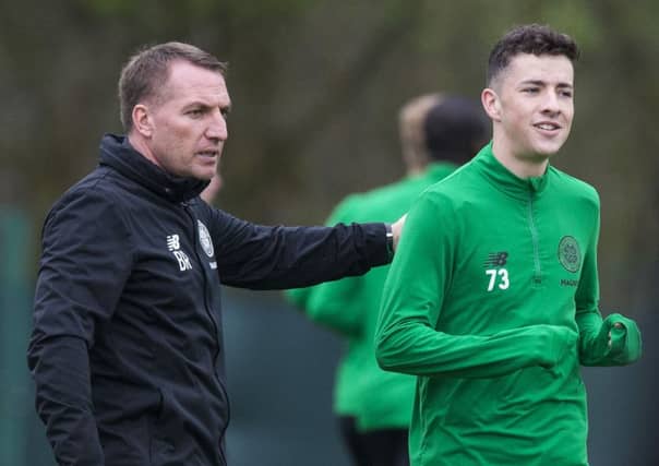 Brendan Rodgers with teenage wigner Mikey Johnston. Picture: SNS Group