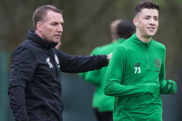 Brendan Rodgers with teenage wigner Mikey Johnston. Picture: SNS Group