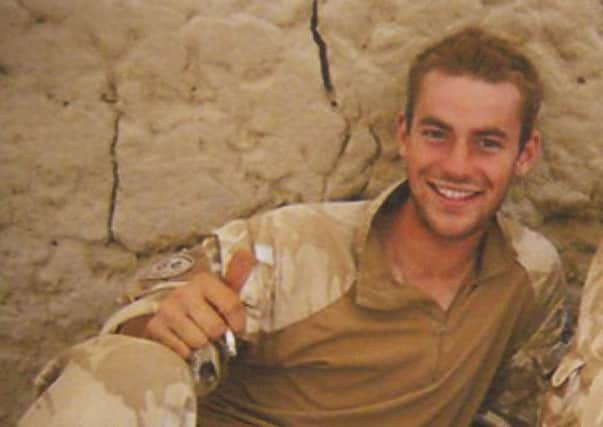 Aaron Black had his medals beside him when he died. Picture: Paul Reid