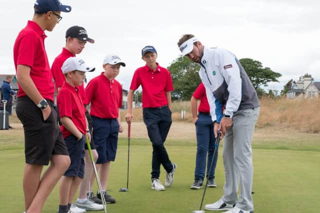 Scott Jamieson with youngsters at Montrose Links. Picture Stuart Adams