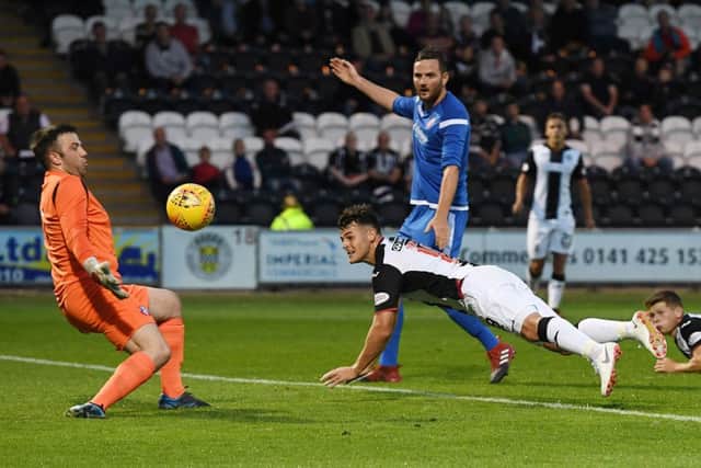 St Mirren's Danny Mullen has a last-minute effort saved by Blair Carswell. Picture: SNS