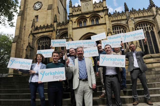Yorkshire Party leader Stewart Arnold (centre) launches the party's 2017 manifesto outside Wakefield Cathedral. Picture: Scott Merrylees/Johnston Press