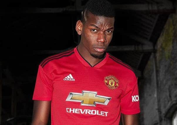Having just scored in the World Cup final, Paul Pogba models Manchester Uniteds new kit. Picture: Adidas.