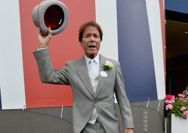 Sir Cliff Richard was awarded Â£200,000 in damages after suing the BBC over coverage of a police raid on his house (Picture: Jeff Spicer/Getty)