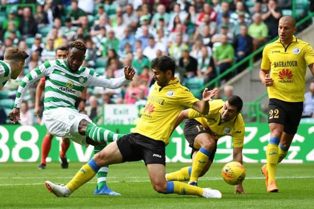 Moussa Dembele opens the scoring for Celtic. Picture: Craig Williamson/SNS