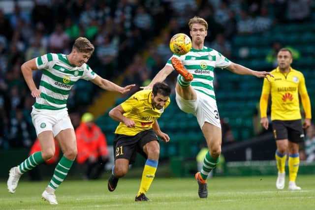 Celtic's Kristoffer Ajer, right, plays the ball during the Champions League qualifier against Alashkert at Celtic Park. Picture: Robert Perry/PA Wire.
