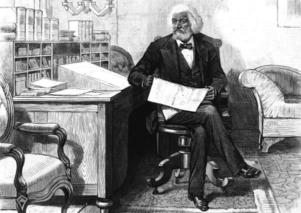 An engraving of Frederick Douglass editing a journal at his desk in the late 1870s. Picture: Hulton Archive/Getty