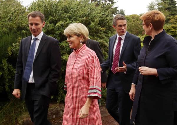 Jeremy Hunt and Gavin Williamson with their Australian counterparts (Photo by David Cheskin - WPA Pool/Getty Images)