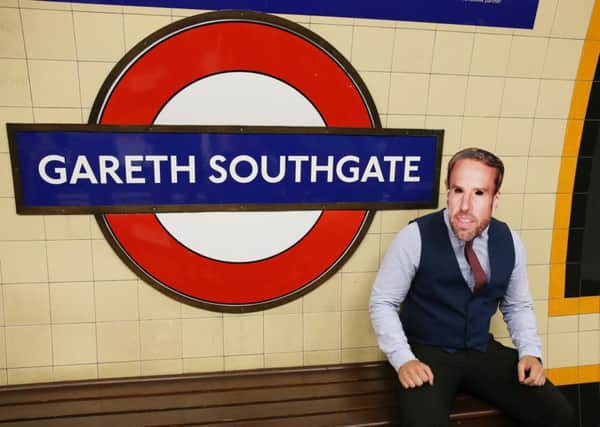 Gareth Southgate,  celebrated here with the renaming of Southgate tube station in London,  has helped England find an inclusive, outward-looking identity (Picture: Neil P Mockford/Getty)