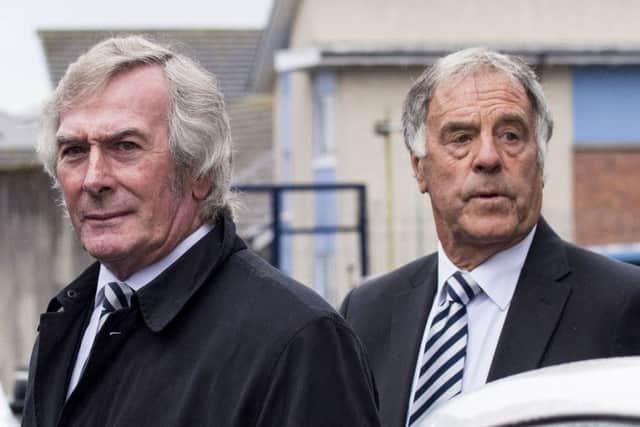 Pat Jennings, left, and Mike England pay their respects at the funeral of Alan Gilzean. Picture: SNS.