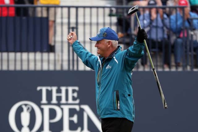 Sandy Lyle acknowledges the cheers after sinking his marvellous birdie putt at one of the toughest closing holes. Picture: David Davies/PA