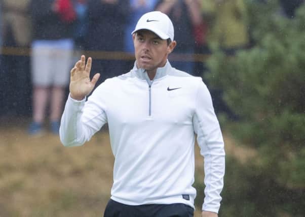 Rory McIlroy acknowledges the Carnoustie crowd during his second round. Picture: Kenny Smith/SNS