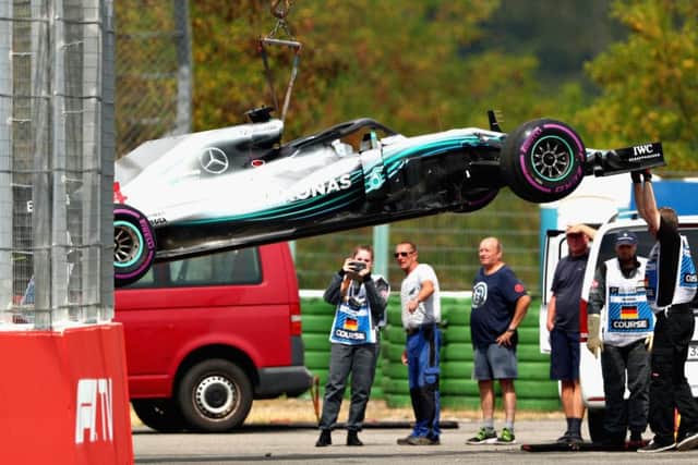 The car of Lewis Hamilton is removed from the circuit after stopping during qualifying. Pic: Dan Istitene/Getty Images