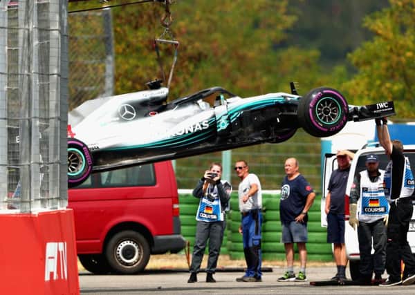 The car of Lewis Hamilton is removed from the circuit after stopping during qualifying. Pic: Dan Istitene/Getty Images