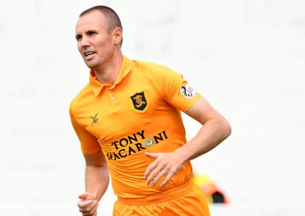 Player-manager Kenny Miller in action for Livingston. Pic: SNS/Craig Foy
