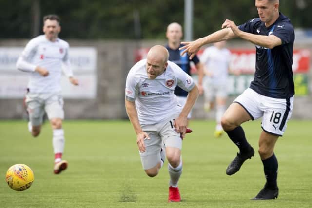 Hearts Steven Naismith in action against Raith's David McKay. Pic: SNS/Paul Devlin