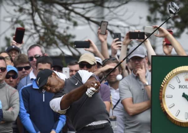 Tiger Woods may trail the likes of co-leader Kevin Kisner but hes very much in contention.Picture: Ian Rutherford