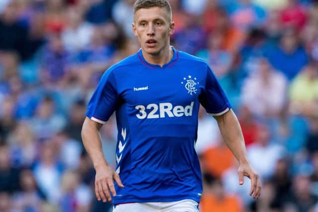 Greg Docherty has been told he's free to move on loan. Picture: SNS