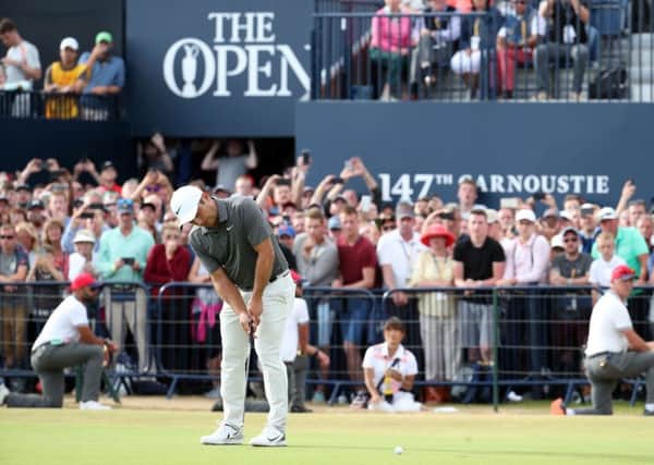 Italy's Francesco Molinari putts a crucial birdie on the 18th during the final day at the Open. Picture: Jane Barlow/PA Wire