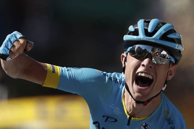 Magnus Cort Neilsen roars his joy as he crosses the line in Carcasonne at the conclusion of Stage 15 of the Tour de France. Picture: AP.