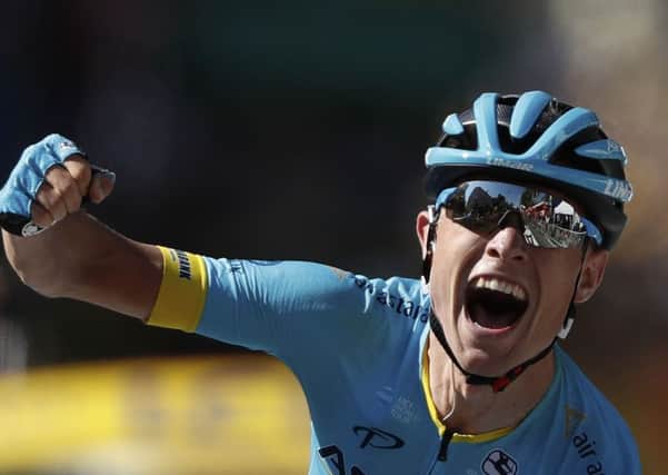Magnus Cort Neilsen roars his joy as he crosses the line in Carcasonne  at the conclusion of Stage 15 of the Tour de France. Picture: AP.