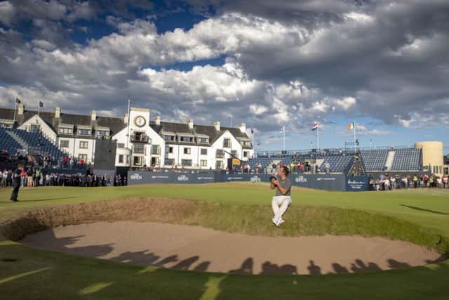 Francesco Molinari celebrates on the 18th after his memorable Open triumph. Picture: SNS