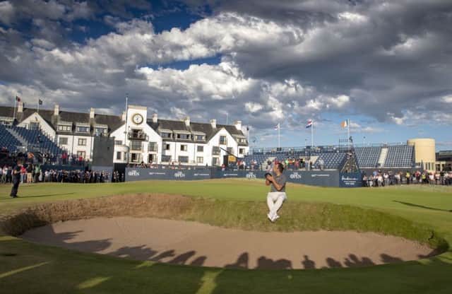 Francesco Molinari celebrates on the 18th after his memorable Open triumph. Picture: SNS