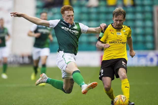 Simon Murray closes down Runavik's Bardur Hansen in the Europa League First Qualifying Round first leg tie at Easter Road. Picture: SNS Group