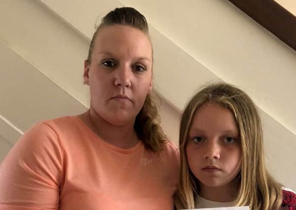 Sarah Eyre from Plymouth, Devon, was upset to recieve a letter that stated her active 11-year-old daughter Emma Louise 'overweight'. Picture: SWNS