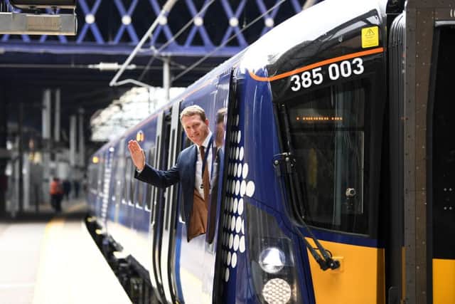 The long-delayed new ScotRail trains made their debut at Queen Street Station on Monday (23 June).
 Picture: John Devlin