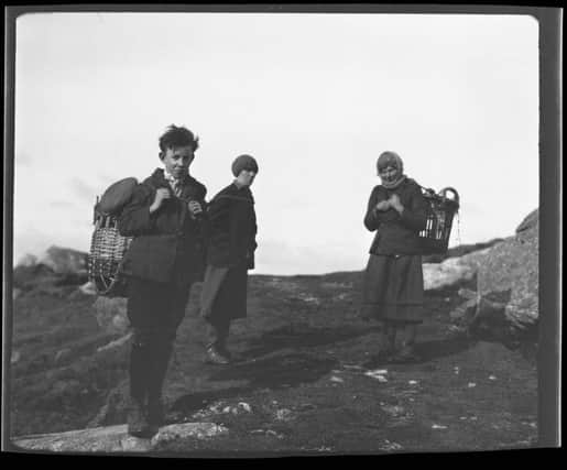 DÃ²hmnall MacRath (Donald MacRae), MÃ iri Anndra (MÃ iri MacRae) and Bean Aonghuis Ruaidh (Mrs Angus Campbell) heading out to gather kelp on South Uist to use as potato fertiliser. PIC: National Trust for Scotland/Canna House.
