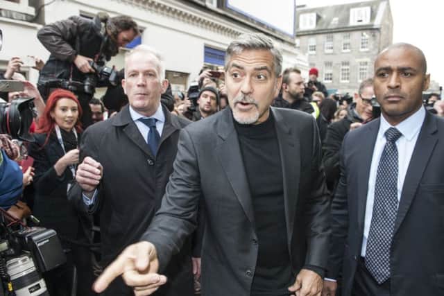 George Clooney visits the Social Bite sandwich shop in Rose Street. Picture: Phil Wilkinson