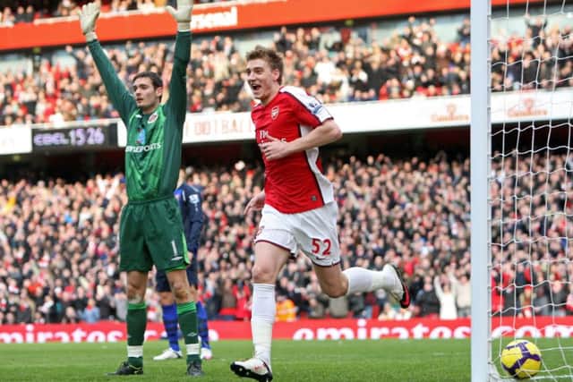 Craig Gordon appeals in vain as Nicklas Bendtner celebrates scoring for Arsenal against Sunderland at the Emirates in 2010.