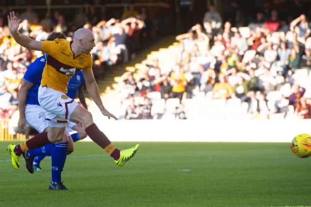 Conor Sammon puts Motherwell in front with a low finish. Picture: Craig Foy/SNS