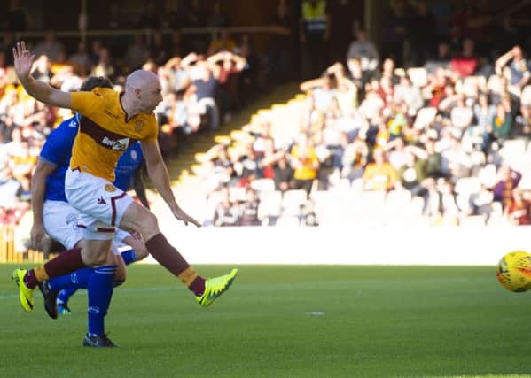Conor Sammon puts Motherwell in front with a low finish. Picture: Craig Foy/SNS