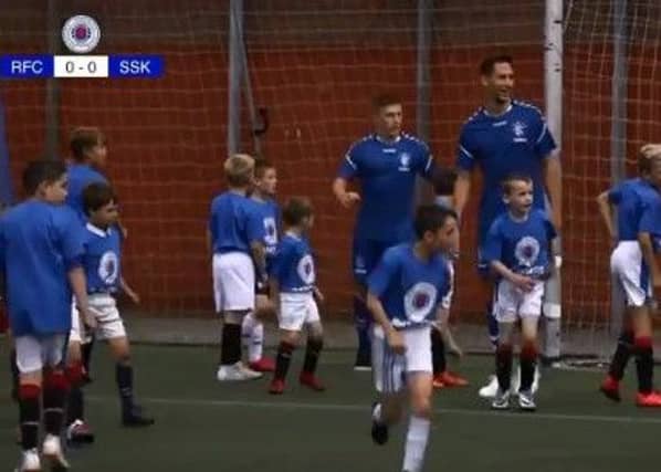 Rangers players take on school kids. Picture: Rangers FC