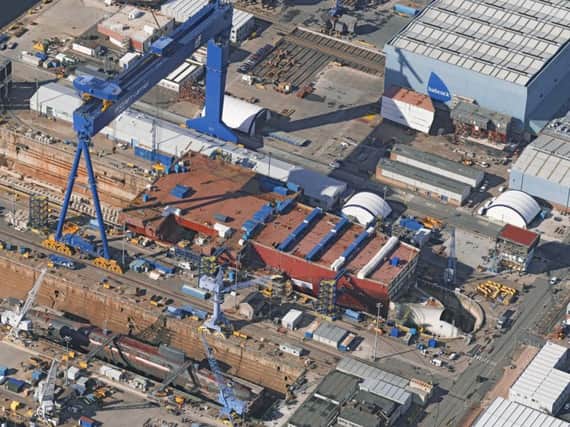 The main dry docks at Babcock Marine's Rosyth Dockyard, with the front half of HMS Queen Elizabeth, the first of the Royal Navy's new aircraft carriers. Picture: PA