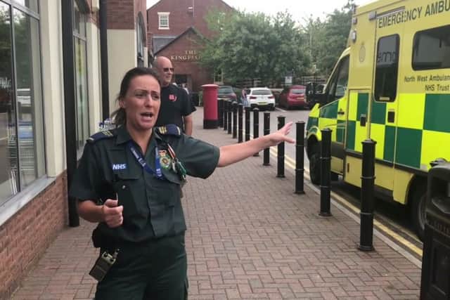 This shocking footage shows the moment a parking warden issued a ticket to paramedics taking a break eight hours into their shift.  Picture: SWNS