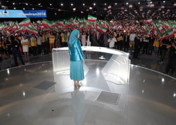 Iranian opposition leader Maryam Rajavi addresses a rally in Paris that was the apparent target of an alleged bomb plot