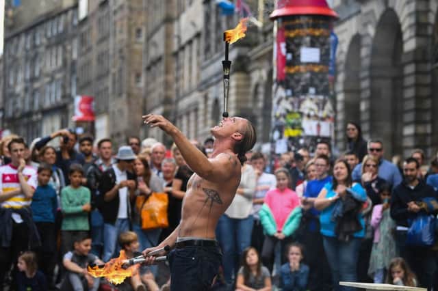 Edinburgh Festival Fringe entertainers perform on the Royal Mile. Picture: Jeff J Mitchell/Getty Images