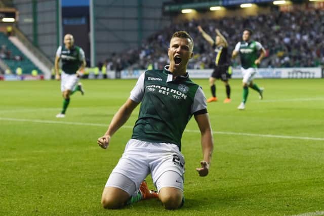 Florian Kamberi celebrates the goal which completed Hibs' 3-2 comeback win. Picture: Paul Devlin/SNS