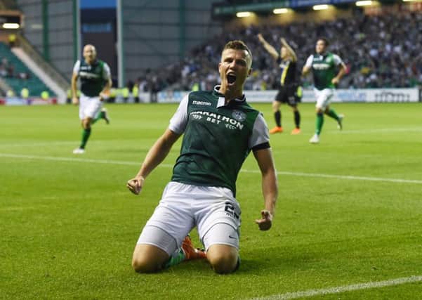 Florian Kamberi celebrates the goal which completed Hibs' 3-2 comeback win. Picture: Paul Devlin/SNS