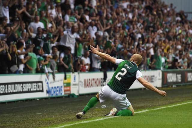 David Gray celebrates after equalising for Hibs. Picture: SNS