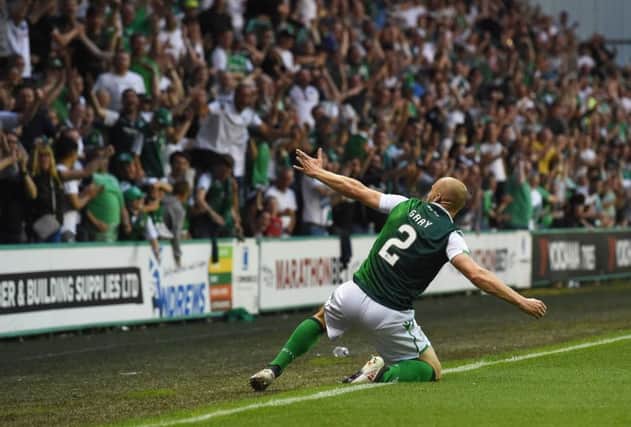 David Gray celebrates after equalising for Hibs. Picture: SNS