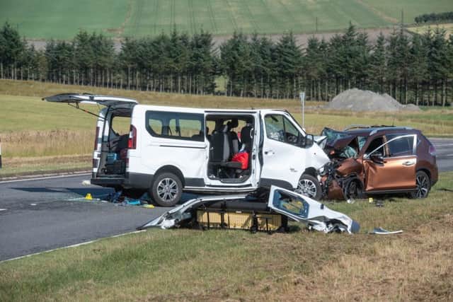 The scene on the A96 between Huntly and Keith in Moray where a five people have died and five more were injured after a crash between a minibus and a car. Picture; PA