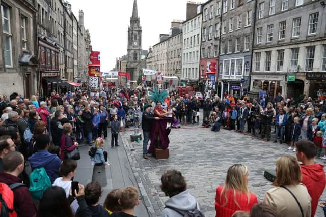 Street performer Able Mable during her act on the Royal Mile in Edinburgh. Picture: Andrew Milligan/PA Wire