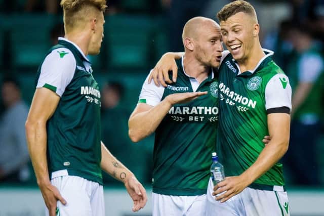 Hibs' Florian Kamberi celebrates his late winner for with David Gray. Picture: Ross Parker/SNS