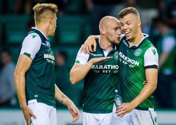 Hibs' Florian Kamberi celebrates his late winner for with David Gray. Picture: Ross Parker/SNS